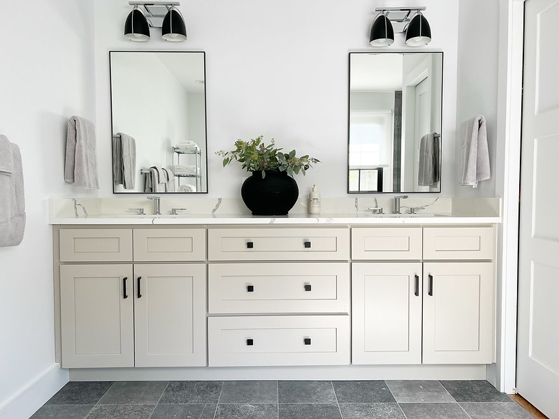 Dual vanities in renovated bathroom