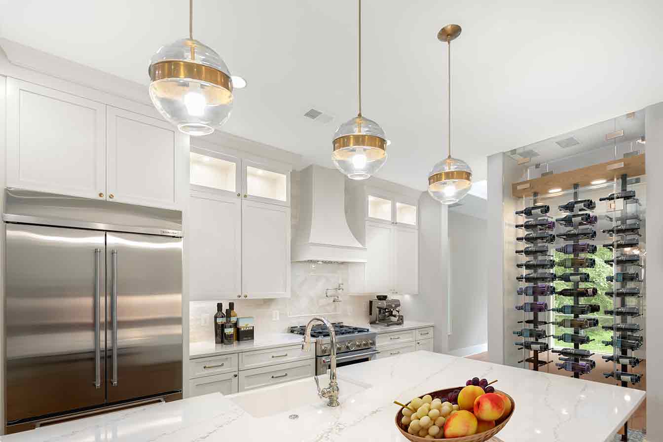 Luxury kitchen island with wine cabinet and high end appliances