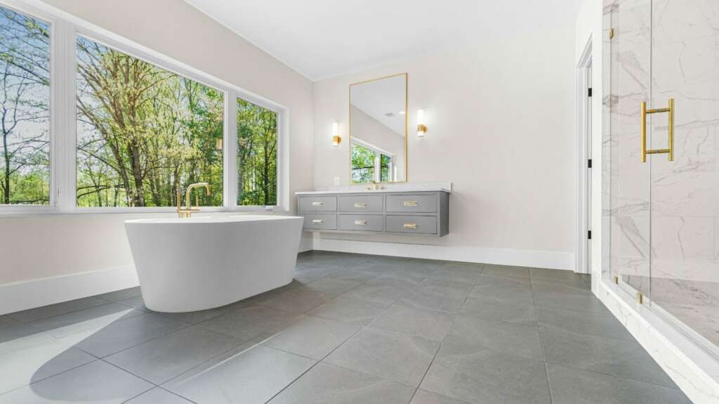 Luxurious Spacious Bathroom Remodeling Layout with Abundant Natural Light.